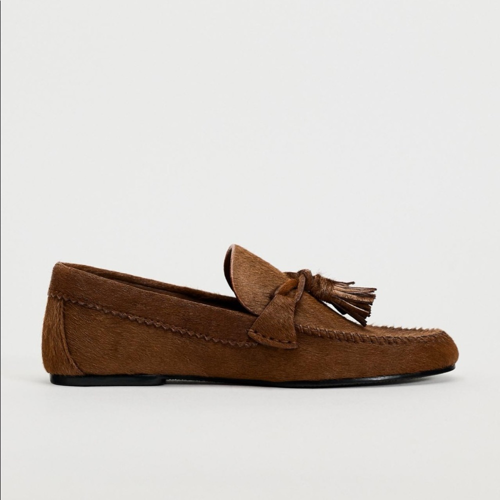 Zara women’s furskin loafers, size 8.